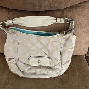 Gray with Turquoise lining Coach hobo purse